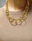 COLLANA DORATA A CERCHI INTRECCIATI