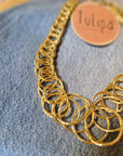 COLLANA DORATA A CERCHI INTRECCIATI