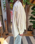 CAMICIA OVER CON DISEGNO SOLE