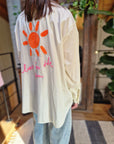 CAMICIA OVER CON DISEGNO SOLE