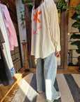CAMICIA OVER CON DISEGNO SOLE
